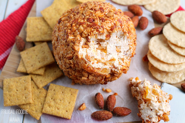 This Sweet & Spicy Sriracha Cheese Ball is the perfect combination of sweet & spicy with its roasted, crunchy sriracha almonds, sweet dried apricots, and an added extra kick of heat from a little sriracha sauce. #ad