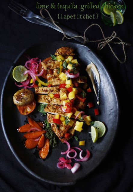 Grilled chicken marinated in a delicious spice rub and tequila, served with a mango salsa and chilli mayonnaise dressing. Its hot, tangy, sweet and spicy all at the same time. This is going to become your favorite chicken dish ever!