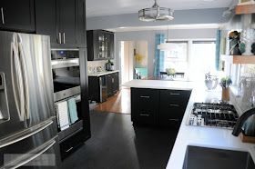 Modern, updated kitchen with open lay out, black cabinets and double oven :: OrganizingMadeFun.com