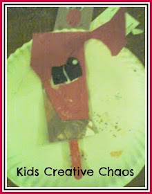 Reindeer paper and popsicle stick craft for toddlers.