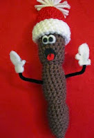 http://translate.google.es/translate?hl=es&sl=en&tl=es&u=http%3A%2F%2Fcreateandcrochet.blogspot.com.es%2F2011%2F11%2Fchristmas-poo.html