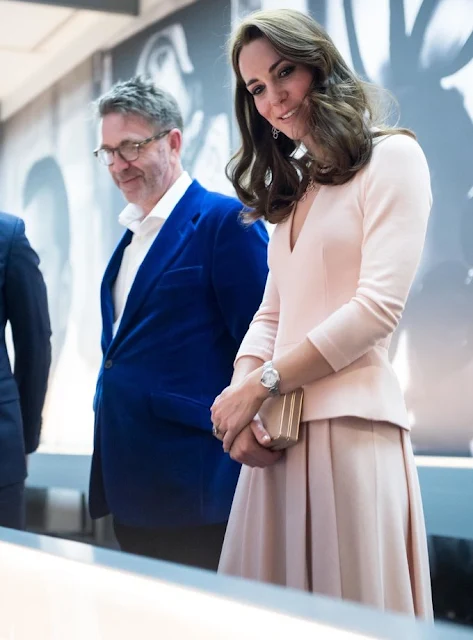 Kate Middleton visits the 'Vogue 100' exhibition. Kate Middleton wore her Alexander McQueen Wool and Cashmere Blend Dress