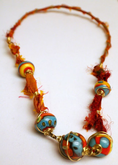 Summer heat: lampwork by Cherry Obsidia, brass wire, sari silk, wire-wrapping, ooak necklace :: All Pretty Things