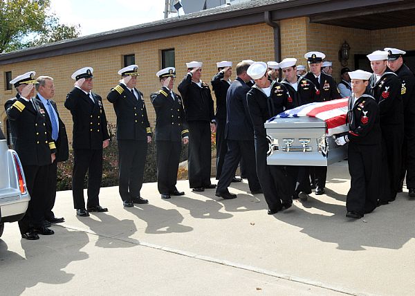 Navy Funeral Uniform Navy seals carry the casket of