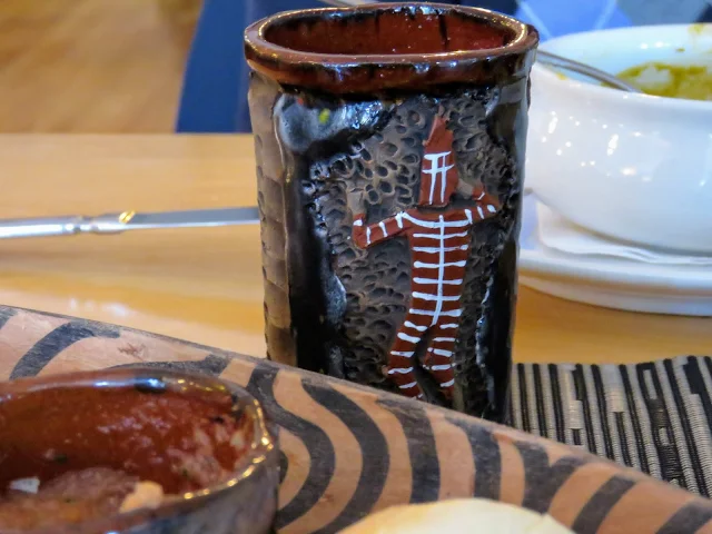 Cup with Selk'nam imagery at Afrigonia Restaurant in Puerto Natales Chile