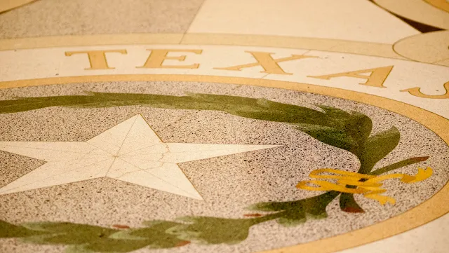 Texas and Lone Star in the floor at the Capitol in Austin