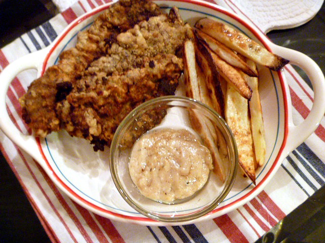 On the menu: Old Fashioned Steak Fingers with Roasted Oven Fries and some milk gravy as a dipping sauce.  Simple, deliscious, comfort food! - Slice of Southern