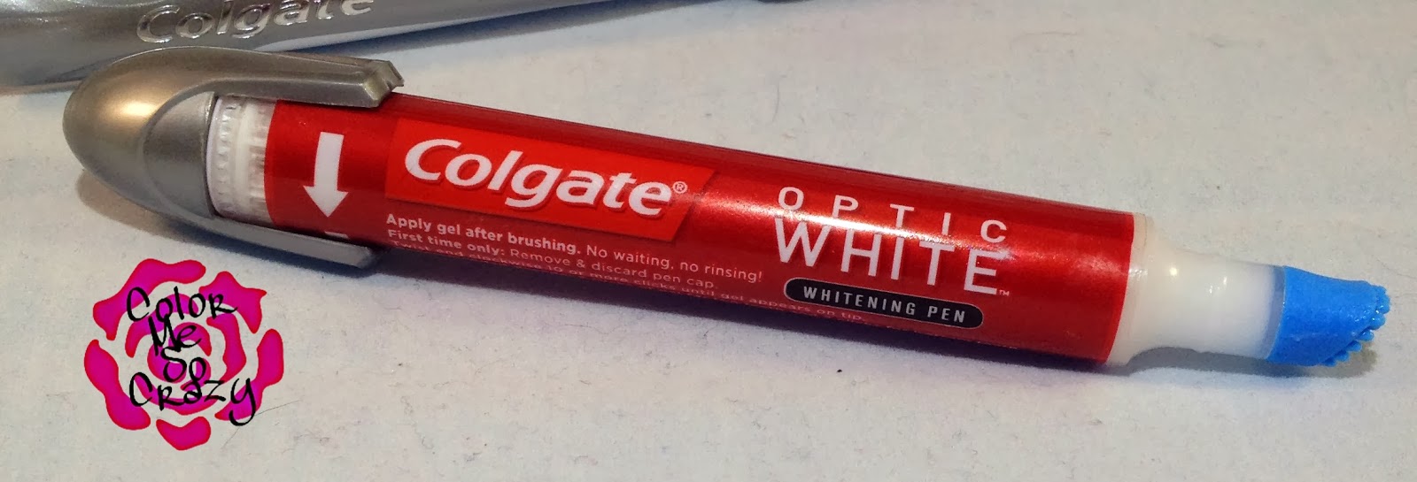 colgate optic white toothbrush built-in whitener