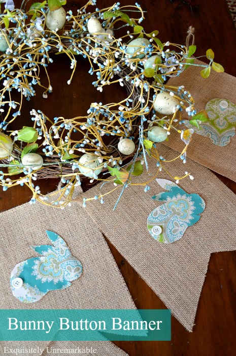 Button Bunny Banner For Easter next to blue egg wreath