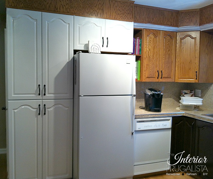 Helpful tips for painting golden oak kitchen cabinets white for a lasting finish plus a two-toned look for a budget-friendly kitchen makeover.