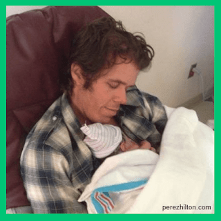Blogger Perez Hilton and his infant son perezhilton.com