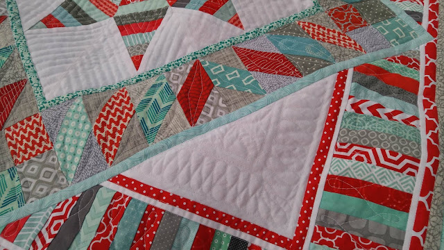 Red and aqua round robin quilt