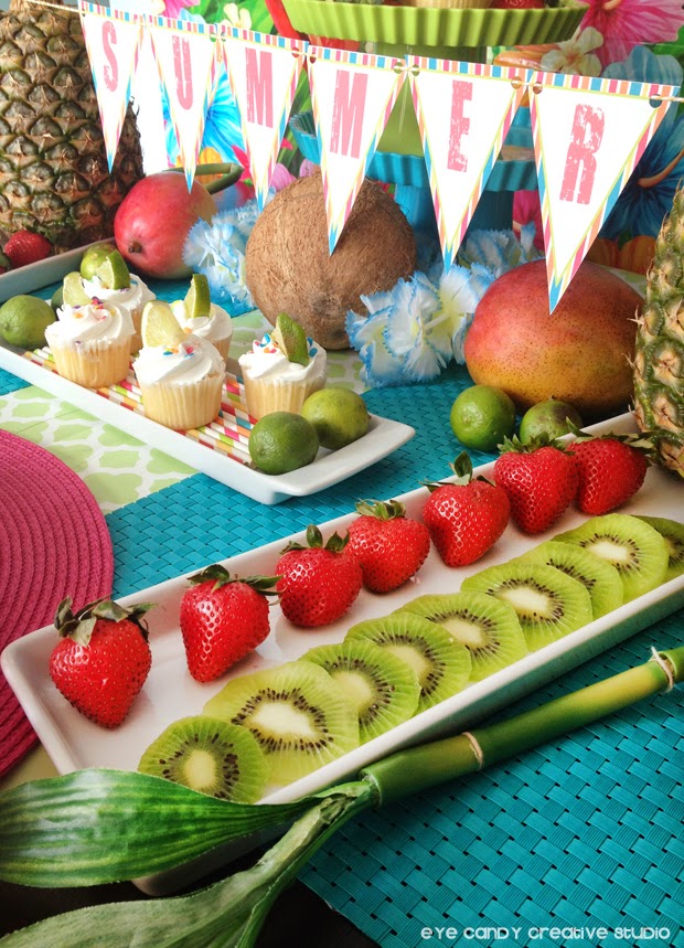 food for a luaa, sliced kiwi, strawberries, FREE summer banner, mango