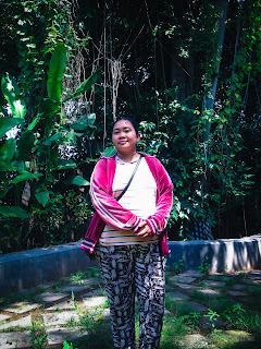 Woman Holiday Portrait At The Park Of Balinese Hindu Temple At Tangguwisia Village, North Bali, Indonesia