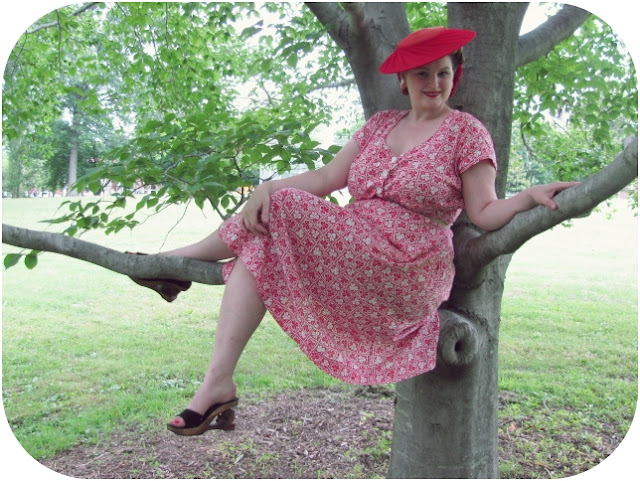 1950s plus size dress and red straw tilt hat via Va-Voom Vintage