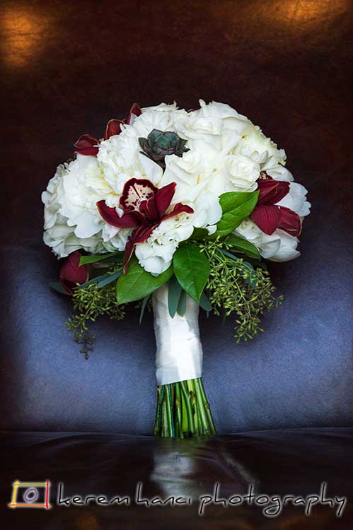 This stately leather library chair was the perfect tableau for this gorgeous bride's bouquet