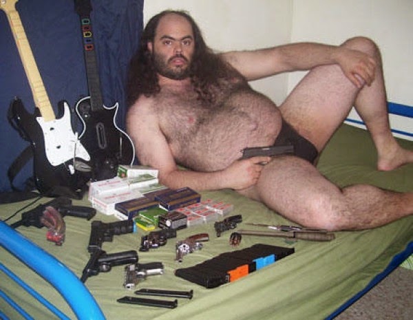 Weird-guy-with-guns-e1342291240754.jpg