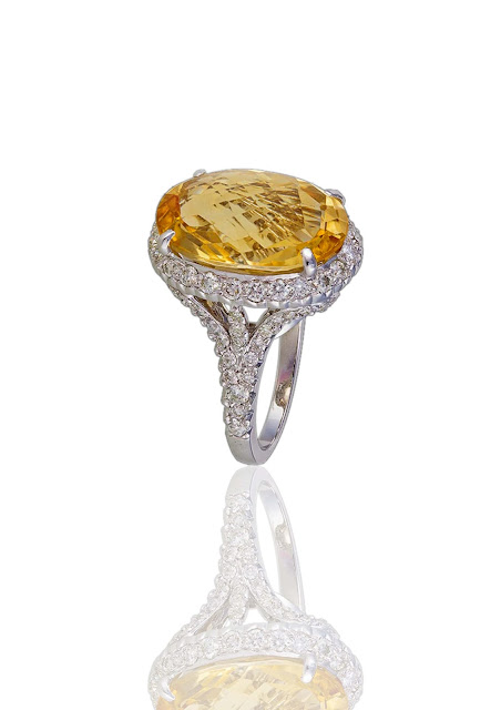 A marvelous oval shaped 11.42 ct citrine ring, handcrafted in 18 kt white gold from MIRARI. A marvelous oval shaped 11.42 ct citrine ring, handcrafted in 18 kt white gold from MIRARI.