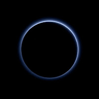 Pluto's Blue Atmosphere