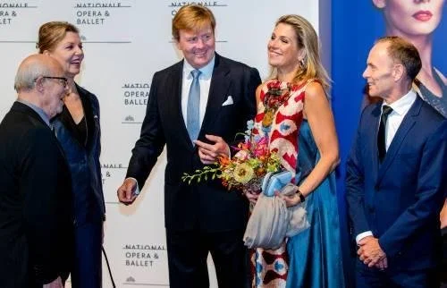 Queen Maxima wore Gianvito Rossi Lola frayed denim sandals and carried Bottega Veneta Knot satin and snakeskin clutch