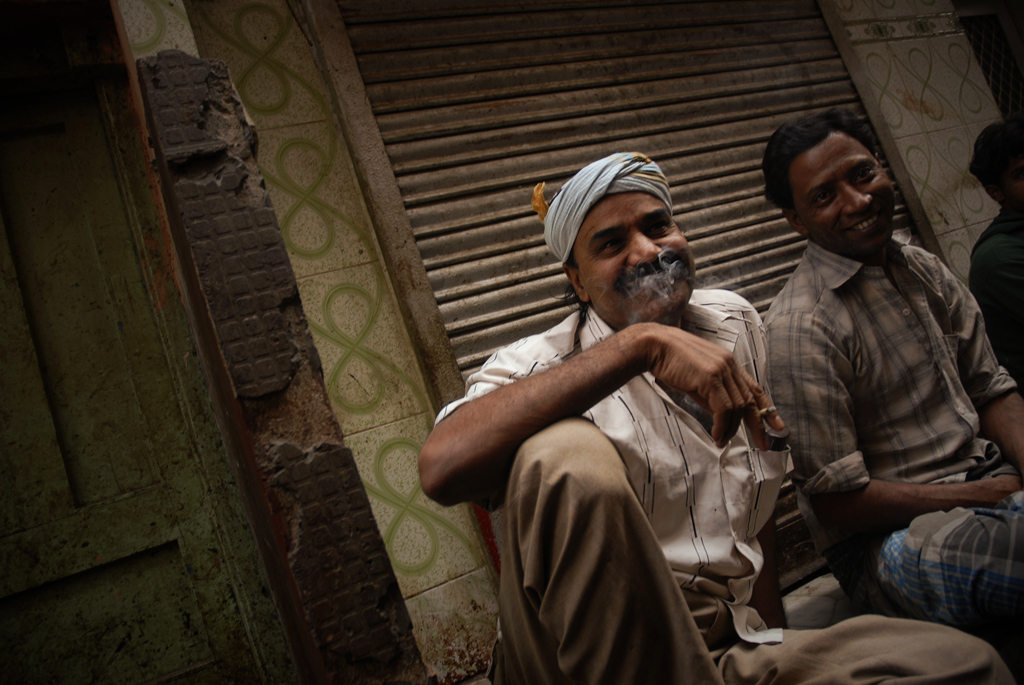 This is an India photo of men laughing in Delhi