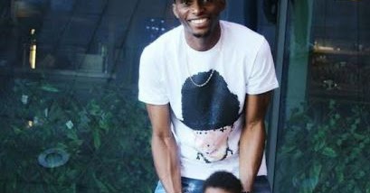 Cute Photo Of Super Eagles Player, Uche Kalu & His Son