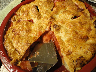 Fresh sweet summer strawberries and tart rhubarb combine to create this homemade fruit pie recipe that everyone will love! An easy summer dessert recipe!