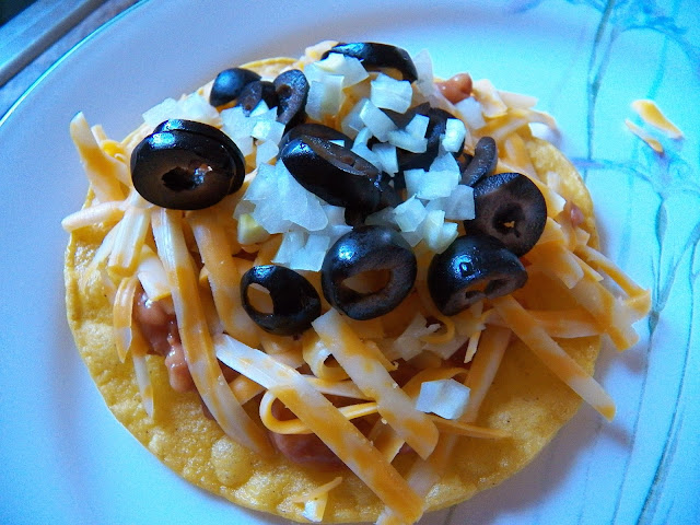 Tostada with Cheese, Onions and Olives