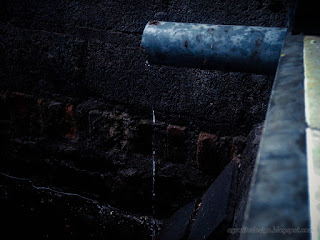 House Rainwater Drain Pipe Flow When It Rains At Seririt Village, North Bali, Indonesia