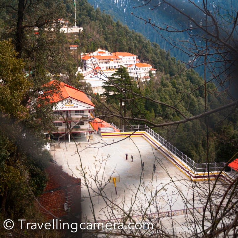 I have been to Dalhousie many times and during last visit, I and Vibha planned to walk around Dalhousie Public School. This beautiful School is located on a huge hill on the road which connected Dalhousie with Khajjiar. This PHOTO JOURNEY shares some photographs of Dalhousie Public School in Himachal Pradesh. Above photograph gives a quick glimpse of the campus, but it's not the whole thing. Dalhousie Public School is spread over two hills around the town. This is one of the most popular boarding schools in Himachal Pradesh.Lot of kids from various parts of the country and abroad come here for studies. It definitely a great place to study and have fun around snow covered hills. It's quite peaceful place and weather is just awesome. When cities like Delhi are hot with 40-45 degrees, these kids wear their jackets in Dalhouise. Instead of Summer vacations, the school is closed for 2 months during winters. Dalhousie Public School has recently started 11th and 12th classes as well. Earlier it was a high school. This was unbelievable. A MIG is installed in the campus of Dalhousie Public School. I don't know much about why and how, but it really sounds interesting :). We were staying in the house you see in above photograph and we wanted to come to this place to ensure that it's real and not a model. Walking up till the student hotels, we realized that even 5 year old kids are also staying here without their parents. This was hard to imagine for us, but it seems that they enjoy being here with their friends and caring staff. Above photograph shows the main campus of the school with all offices and class-rooms. This is first building you see when coming from Dalhousie Town towards Khajjiar. There is approximately 1 km stretch of Dalhousie-Khajjiar road, which is beautifully maintained by Dalhousie Public School. Due to snowfall all the flowering plants had died but staff was actively working to make these pot happy with new plants. Principal's residence @ Dalhousie Public School. Like the whole campus of the school, residences of teachers and principal was quite nice. Here is a view of Ravi river from Teacher's residences. Ravi  river looks stunning on a sunny day. The day we visited Dalhouise, it was rainy and cloudy.