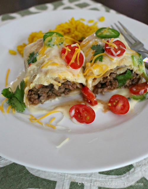 Oven Baked Beef and Bean Burritos for a weeknight or celebration. Great dinner for Cinco de Mayo! Ground beef, beans, salsa, and toppings in crispy, oven-baked burritos. 