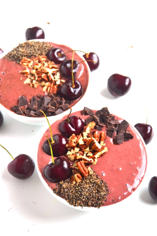 Chocolate Cherry Smoothie Bowls take 5 minutes to make and are the perfect breakfast, snack or dessert. Loaded with cherries, cocoa, banana and cherry yogurt and topped with fun toppings! www.nutritionistreviews.com