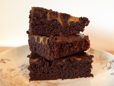 Plate with stacked sweet potato brownies.