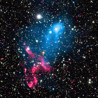 Colliding Galaxy Clusters & Eruption from a Supermassive Black Hole
