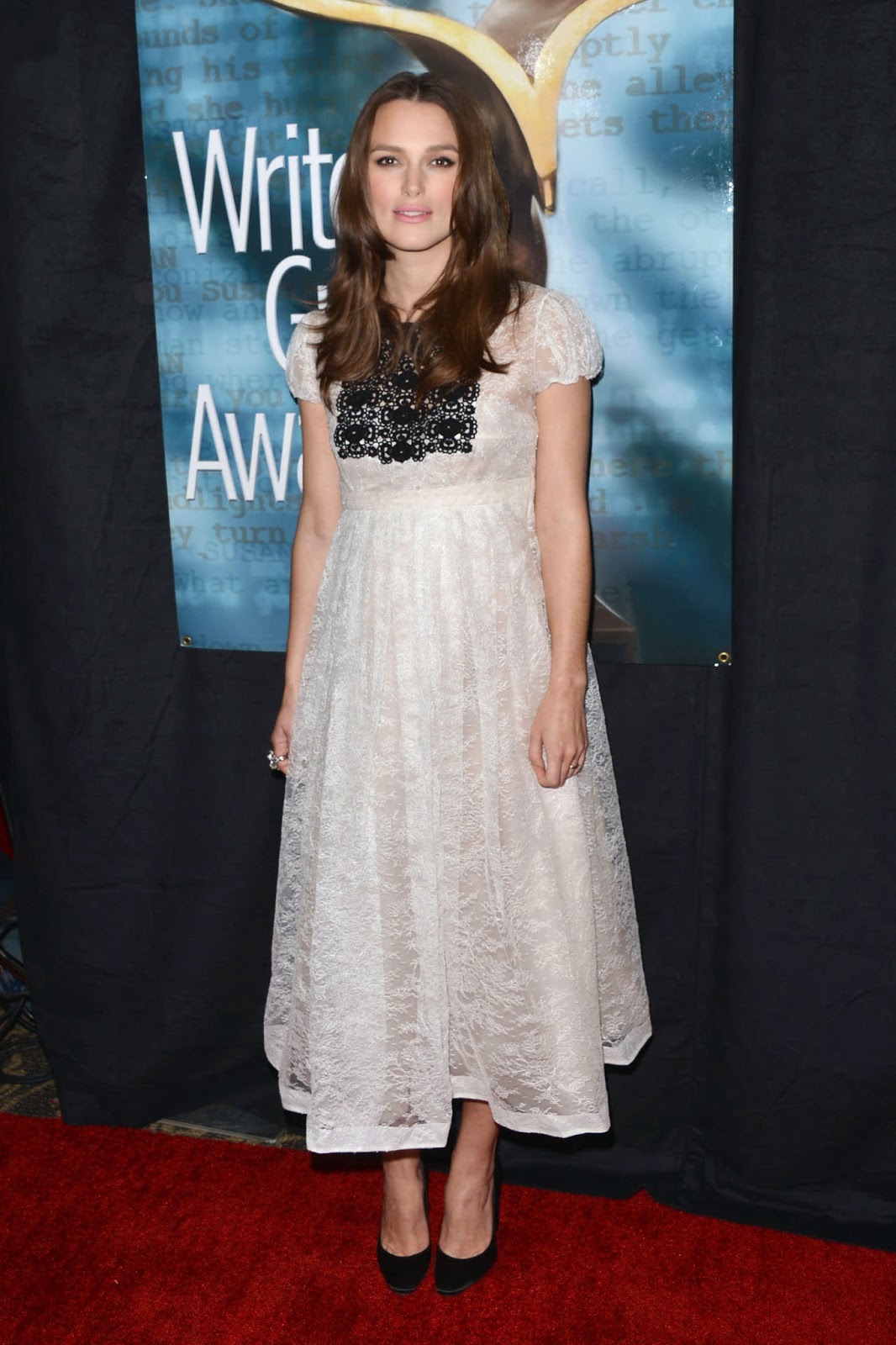 Pregnant Keira Knightley glows in a white lace dress at the 2015