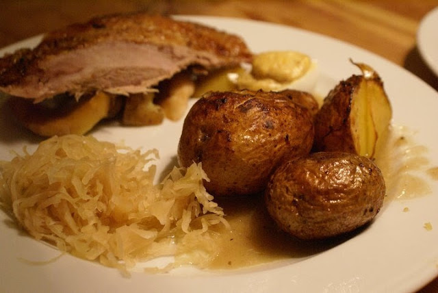 German meal goose potatoes sauerkraut
