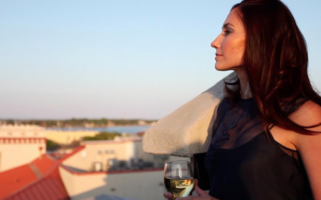 St. Augustine is full of history and culture brunette on rooftop in St. Augustine