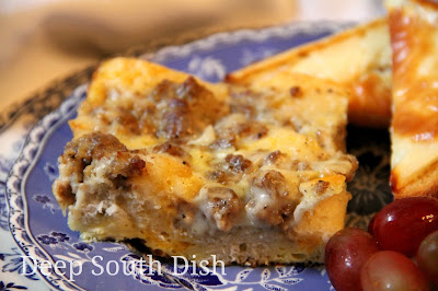 A breakfast casserole made with eggs, biscuits and sausage gravy.