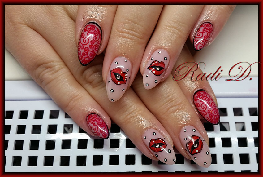 It`s all about nails: Red nails with lips