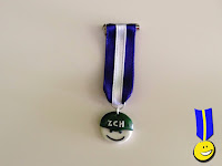Medalla zafarranchito Medalla con logotipo de Zafarrancho