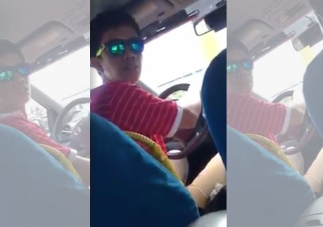 Abusive taxi driver caught on video.