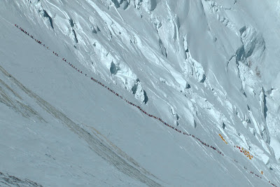 Long queue of people climbing up to the South Col on Everest