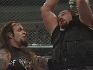 WWE / WWF Wrestlemania 15: Undertaker hangs Big Boss Man