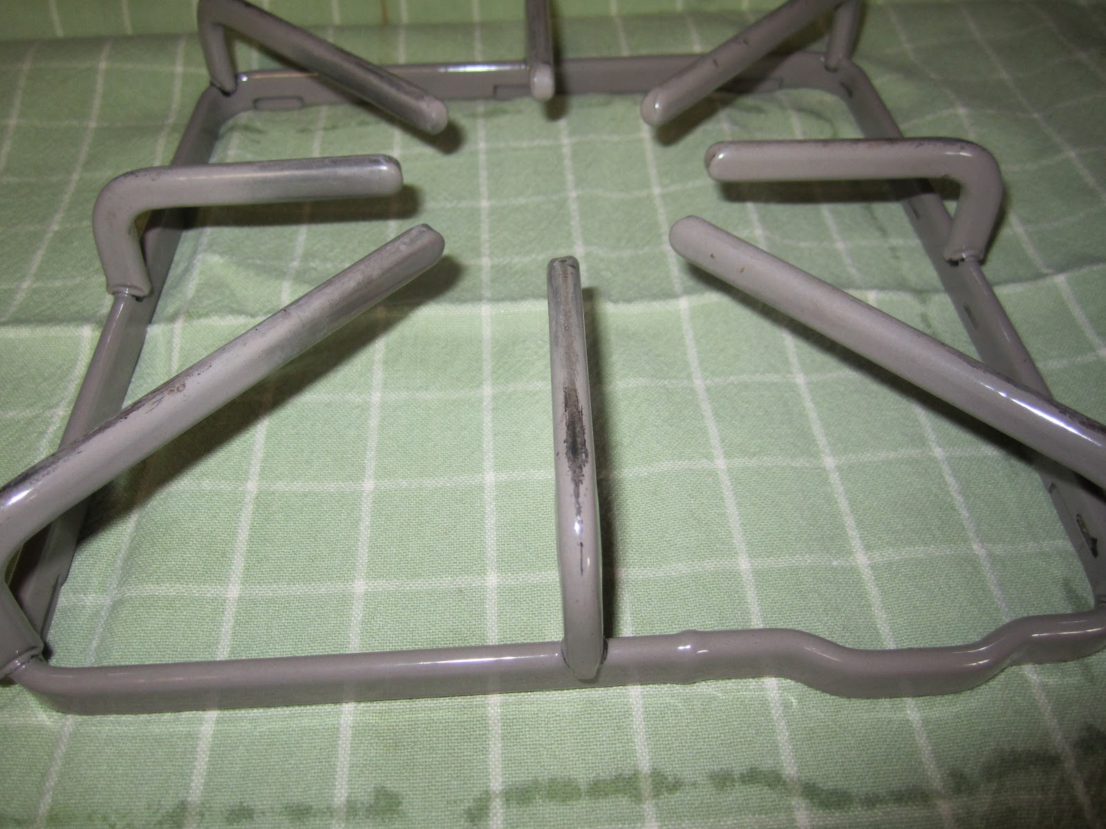 Molly's Kitchen Cleaning stove grates