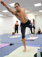 Rendall in standing bow pose.