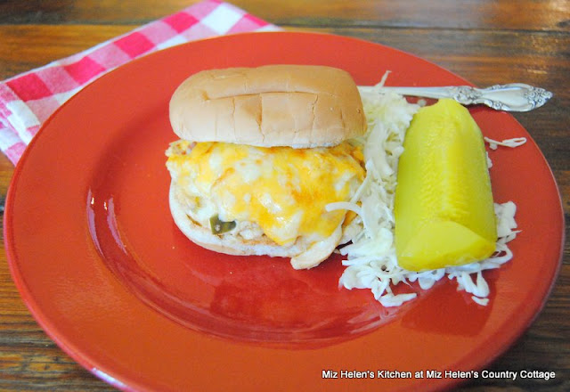 Slow Cooker Cheesy Ranch Chicken Sandwich is a flavorful dish that can be used as a sandwich, dip or a main dish. It is a great busy day recipe. Miz Helen's Country Cottage