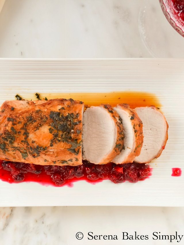 Rosemary Sage Pork Loin Roast with Cranberry Orange Sauce is a family favorite recipe. Easy and elegant! Perfect addition to Thanksgiving and Christmas dinner from Serena Bakes Simply From Scratch.