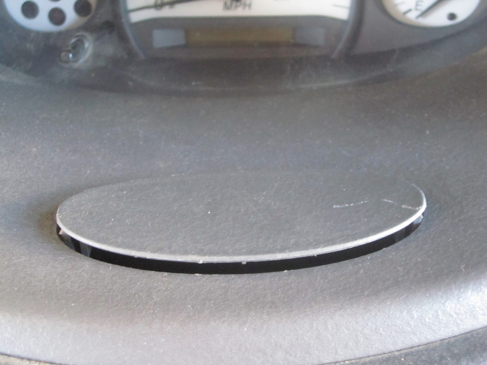 Mess of the Day PSA Changing a lightbulb behind the dash of a Toyota Echo