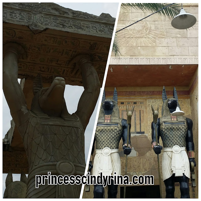 Egyptian jackal guardian statues guarding a tomb