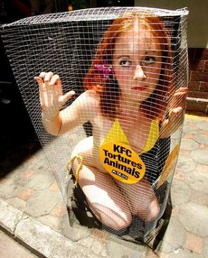 [Image: animal-rights-protester-ginger-cage-girl.jpg]